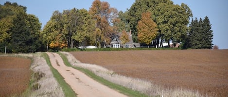 long driveway to farmhouse