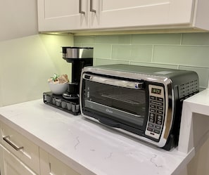 Toaster oven and K pod coffee machine in kitchen