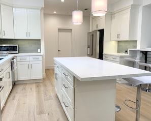 Fully equipped kitchen, modern stainless steel appliances