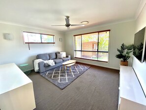 2nd Living room with Foxtel. Double person sofa lounge.