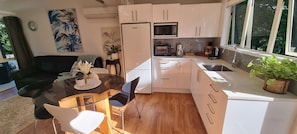 Everything you need to cook.  Benchtop oven,  elements, slow cooker, microwave. 
