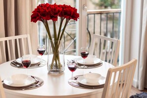 Dining table with tableware.