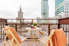 Furnished balcony with an incredible view of the city with the Palace of Culture and Science.
