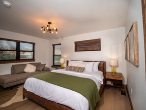 Main level master bedroom with attached private bathroom