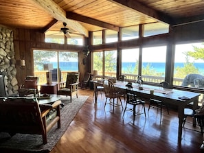 Main floor facing Lake MI. Farm table fits 12-14.  Facing southwest.