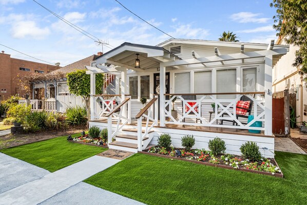 front of cottage with seating