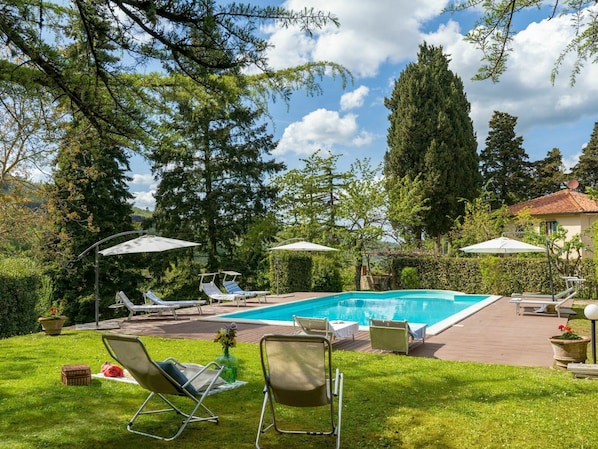 Cloud, Plant, Property, Furniture, Sky, Table, Water, Building, Shade, Swimming Pool