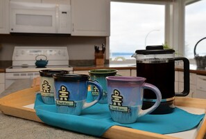 Coffee, tea, cream, sugar is stocked for you