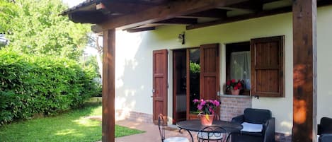 Plant, Building, Property, Window, Door, Sky, Flowerpot, Chair, Shade, Table