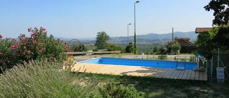 Plant, Sky, Water, Street Light, Tree, Land Lot, Swimming Pool, Body Of Water, Shade, Residential Area