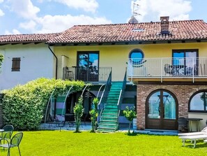 Building, Plant, Cloud, Sky, Window, Property, Green, Blue, Door, House