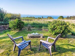 Furniture, Outdoor Furniture, Chair, Landscape, Land Lot, Groundcover, Outdoor Table, Garden, Lawn, Shade