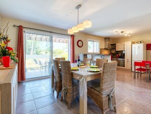 Furniture, Table, Chair, Cabinetry, Plant, Wood, Houseplant, Interior Design, Window, Kitchen