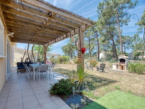 Plant, Sky, Shade, Tree, Cloud, Chair, Outdoor Furniture, Residential Area, Leisure, Cottage