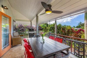 Lush garden views and outdoor seating on the lanai