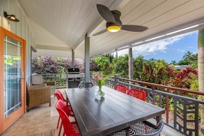 Lush garden views and outdoor seating on the lanai