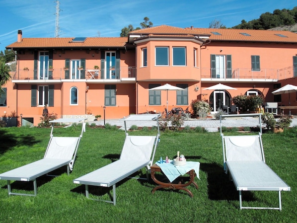 Sky, Property, Building, Plant, Window, Outdoor Furniture, Shade, Leisure, Grass, Residential Area