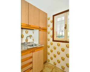Room, Yellow, Property, Furniture, Floor, Interior Design, Tile, Bathroom, Building, House
