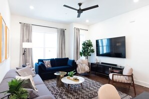 Our open-concept living area provides a seamless flow of space, ensuring your utmost comfort and enjoyment.