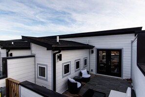 Experience stunning city views from your two exclusive rooftop terraces.