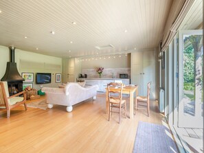 Cosy living area with wood burner | Lymington Lodge, Lymington