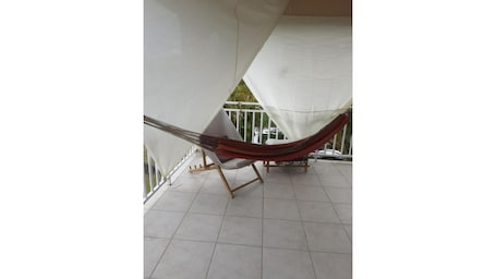 espace détente sur véranda vue mer