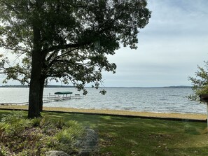  View of the lake and dock, 100 feet of sandy beach
