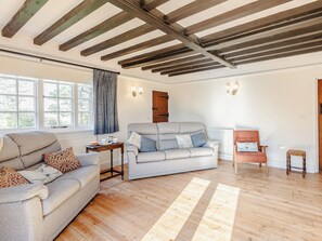 Living room with plenty of room for family celebrations | Mark Farmhouse, Tillingham, near Southminster