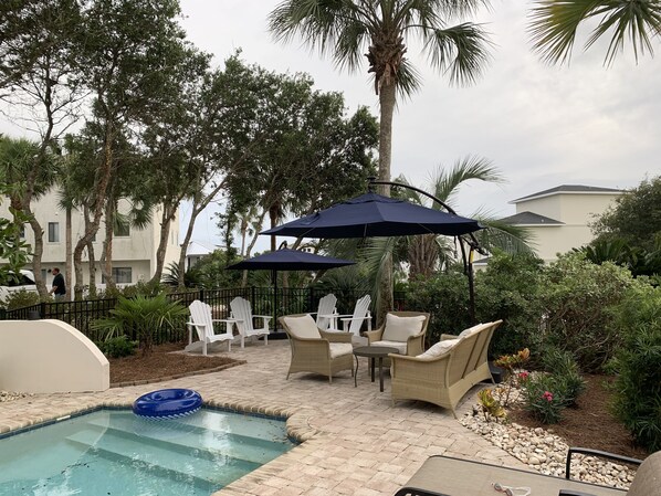 TROPICAL POOL AREA - HEATED POOL WITH TANNING LEDGE/KIDDIE POOL DEPTH.  