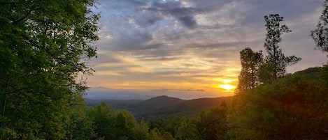 Sunrise. Long range mountain views from deck, master bedroom, main living area.