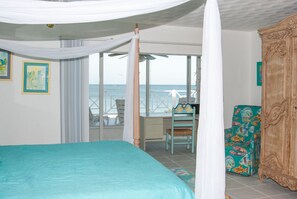 Master Bedroom with an office , views of beach, large tv, attached large bath