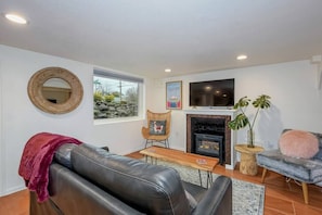 Living area with smart TV - sign in to your Netflix, Hulu, HBO account etc.