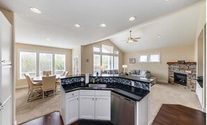 We have an open living, kitchen, and dining area, perfect for entertaining. 