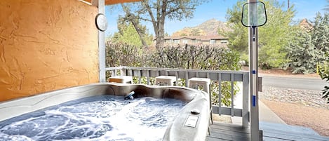 Side deck Hot tub with Red Rock views