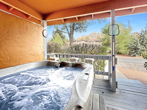 Side deck Hot tub with Red Rock views