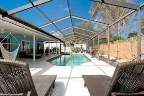 Kick back and relax by the pool.