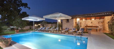 Pool lighting creates a romantic environment