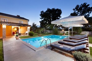 Pool lighting creates a romantic environment