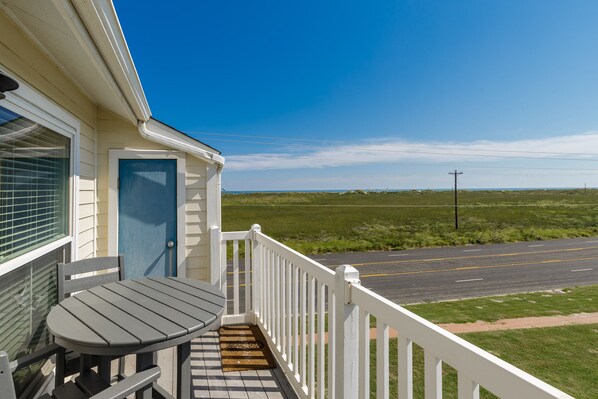 Enjoy your morning coffee with ocean breezes on your private balcony, just a short stroll from the beach