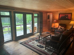 New french doors and floor to ceiling windows for better lake view