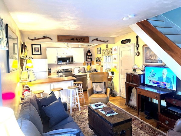 View from entrance into living room and kitchen