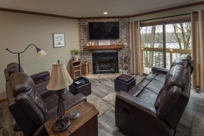 Open Living with Fireplace, Flat Screen TV and Lake View