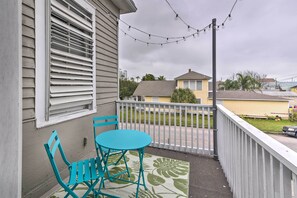 The 2-bedroom, 1-bathroom unit boasts a furnished private terrace.