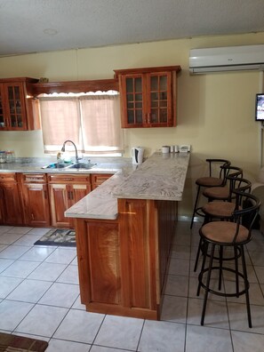 Dining Area with bar stools at counter