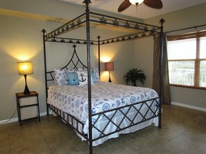Master Bedroom With Queen Sized Bed And Private Bathroom Attache - Master Bedroom With Queen Sized Bed And Private Bathroom Attached. That Window Overlooks The Intercoastal Waters Of Indian Rocks Beach!