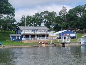 Fantastic location on 1 acre, huge decks, water toys What more could you ask for