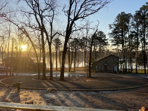 Great view of sunrise and large circular drive. 