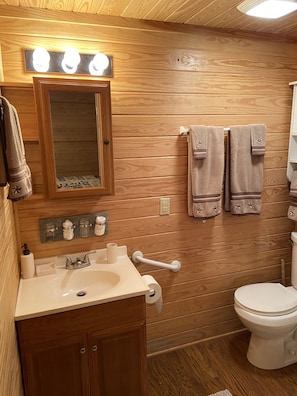 vanity area with towels