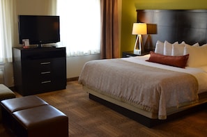 Drift to sleep in a comfortable bed after a busy day.