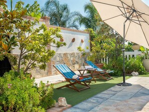 Plant, Property, Furniture, Plant Community, Building, Sky, Nature, Azure, Shade, Outdoor Furniture